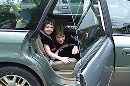 Kids traveling by car